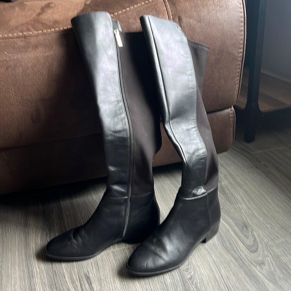 Size 8 Michael Kors tall black boots, worn maybe twice and received as a gift.